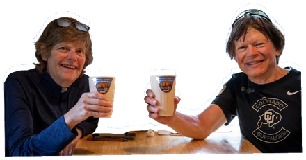 Two friends toasting with Colorado Cups